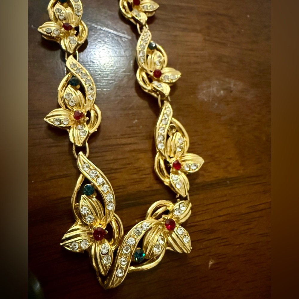 Gold Floral Necklace with Red and Green Details